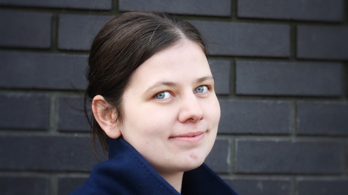 Colour photograph of Erin Stewart's face, smiling.