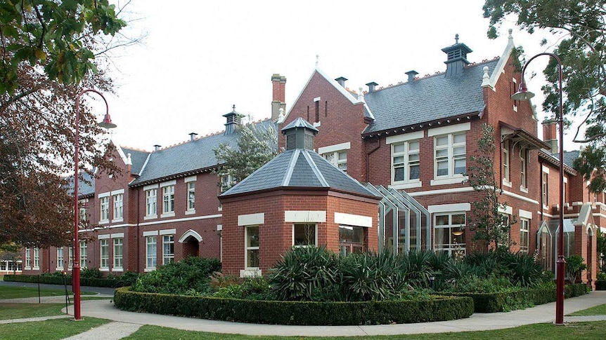 Image of red-brick, double storey Victorian building