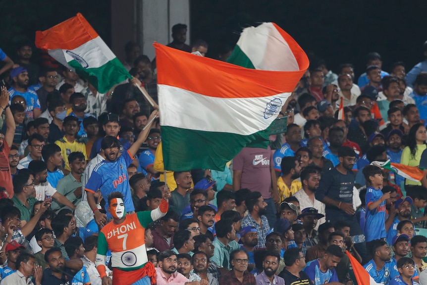 India fans wave a giant India flag