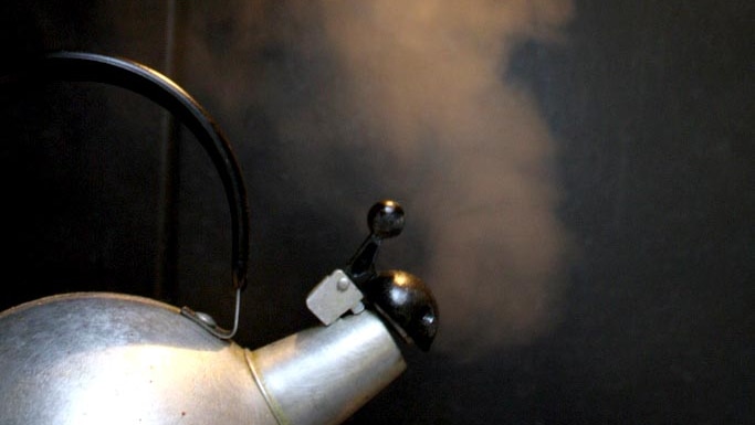 Steam kettle boiling.