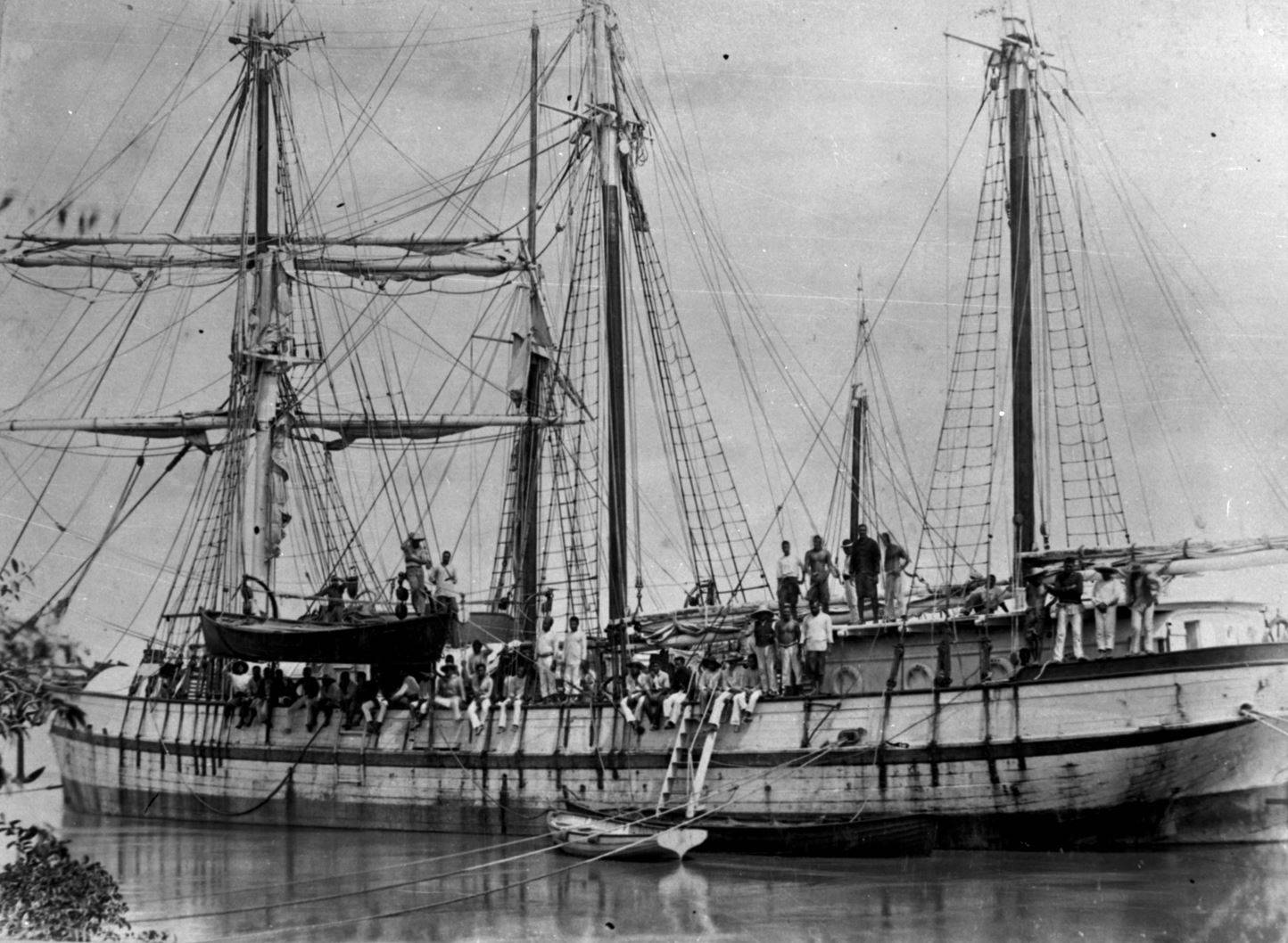 Black and white image of a large ship carrying Pacific Island workers. 