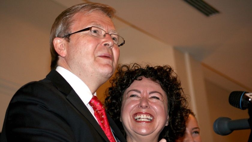 Mr Rudd, with wife Therese Rein, claims victory in the seat of Griffith.