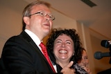 Mr Rudd, with wife Therese Rein, claims victory in the seat of Griffith.