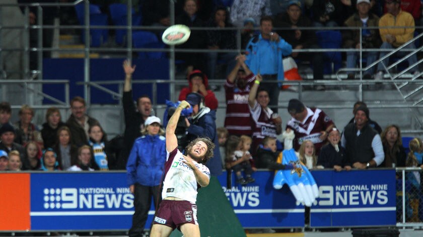 David Williams of Manly celebrates his length of the field try