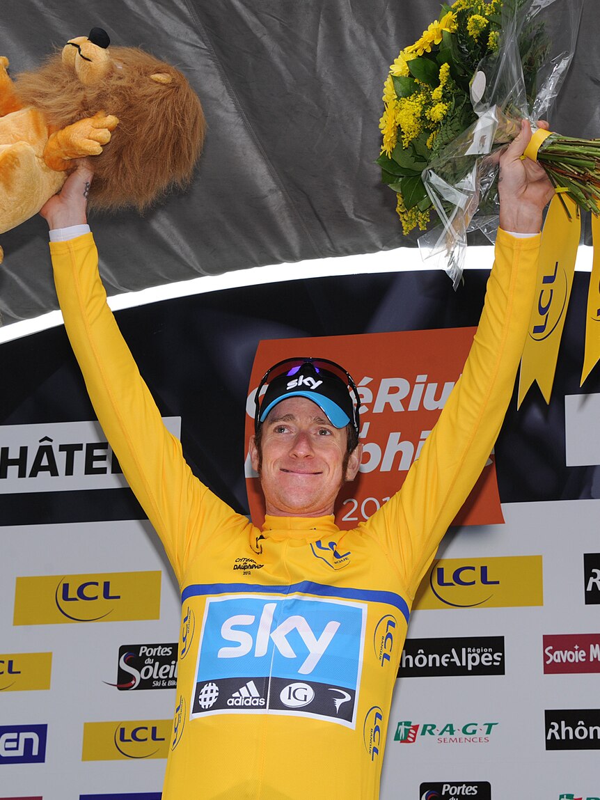Two in a row ... Bradley Wiggins celebrates his win after the eighth and final stage.