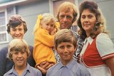 A colour vintage photo of Paul Hogan, his three sons, one daughter and wife