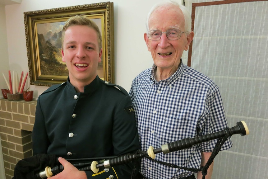 John Craig with his grandson at his home in Sydney