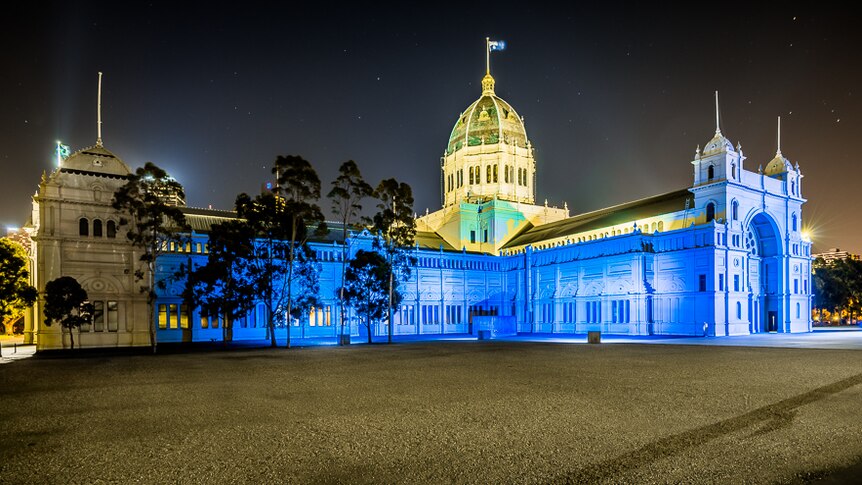 Royal Exhibition Building in Melbourne, lit up in blue for UN 70th anniversary