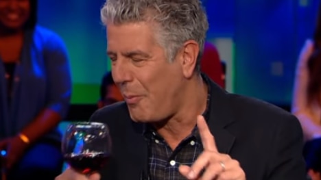Anthony Bourdain's face after eating maggot fried rice. "He's beginning to crack," Piers Morgan joked.