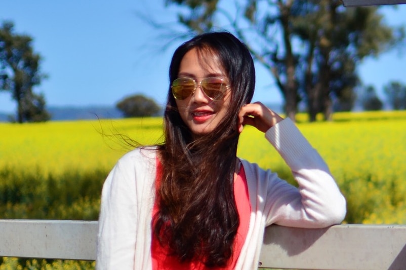 A Chinese woman wearing sunglasses