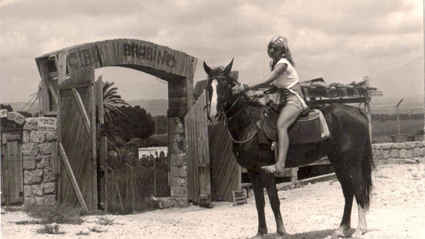 Rina Avivi seen in the 1970s riding her horse near the museum.