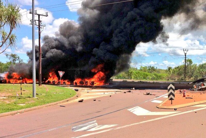 A road train on fire after a crash on Berrimah Road, near Darwin.