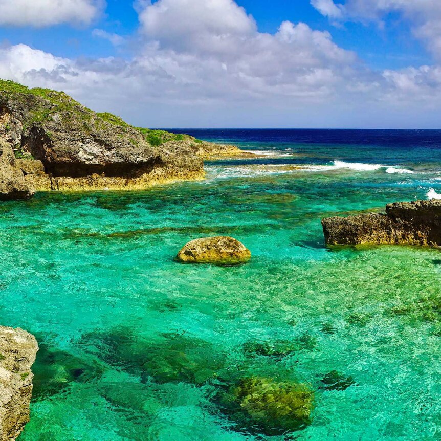 Clear water rock pools along the coast line of Niue