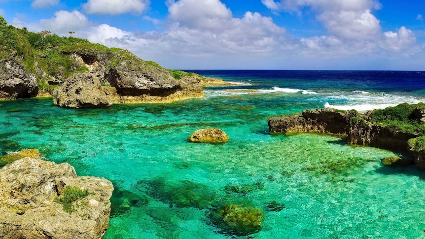 Clear water rock pools along the coast line of Niue