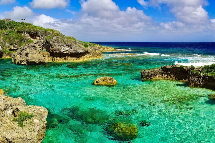 Clear water rock pools along the coast line of Niue