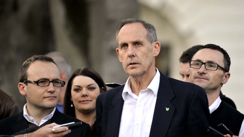 Greens senators and MPs Bob Brown, Adam Bandt, Sarah hanson Young and Richard Di Natale in Melbourne (AAP: Alan Porritt)