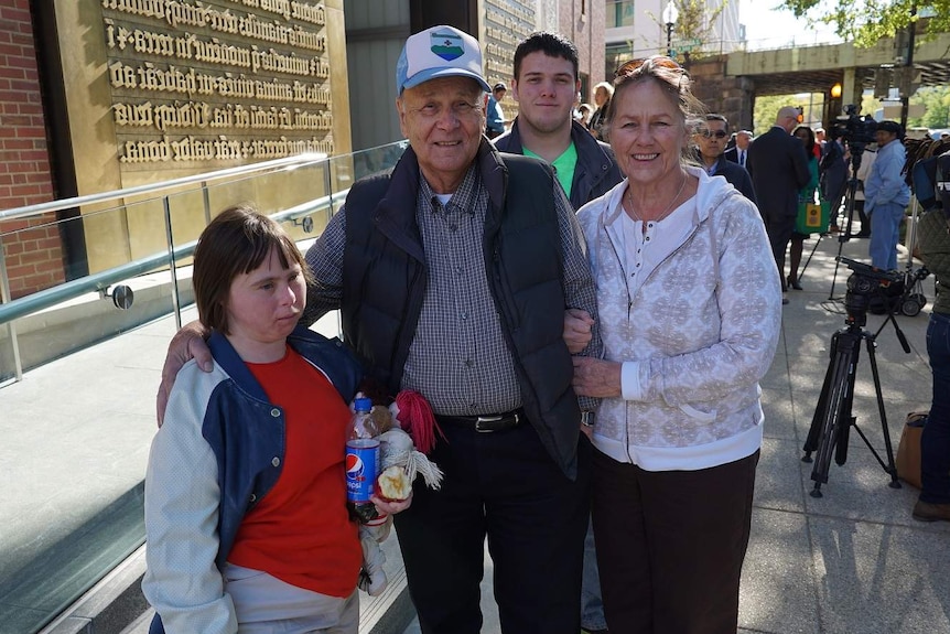 Vermont woman Eleanor and Michael Twardy stand together with two younger people outside the Museum of the Bible