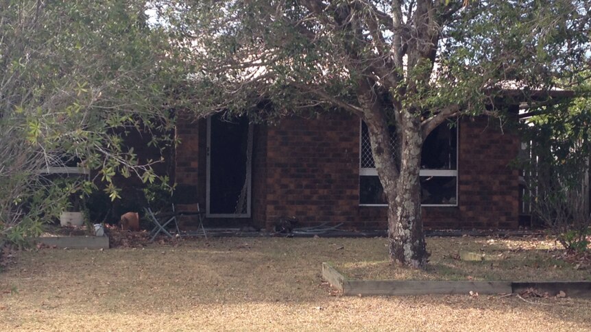 Authorities found a man's body in this house at Caboolture South, north of Brisbane.