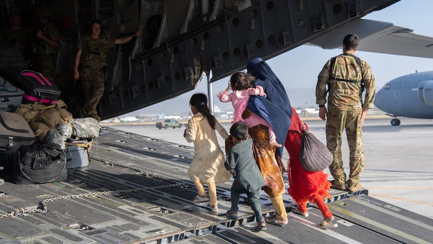 Family amongst the rubble in Kabul