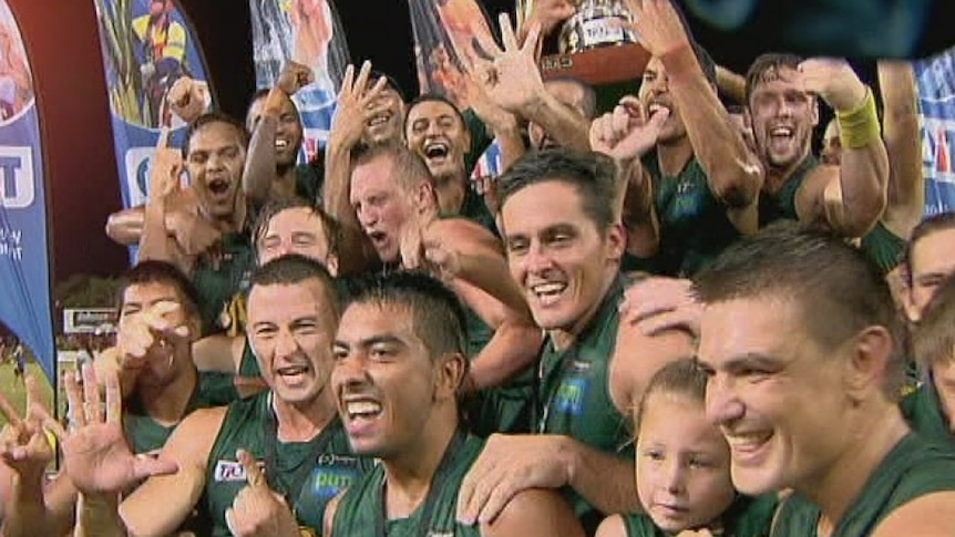 NTFL team St Marys celebrates its premiership win for the 2013-14 season.