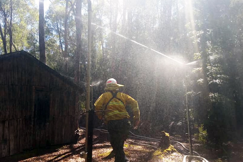 Sprinklers trained on Churchill's Hut during the Gell River fire