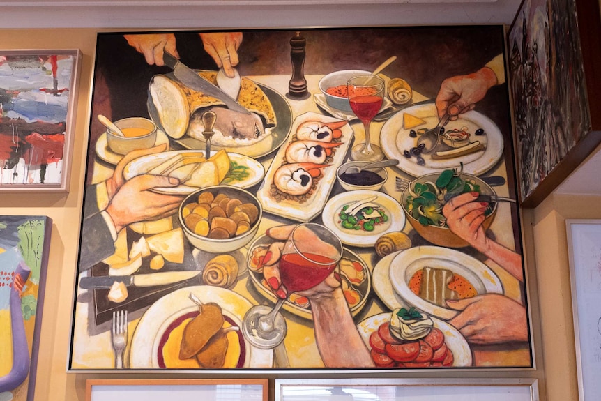 Fred Cress' Lucio's Food painting hanging in Lucio's