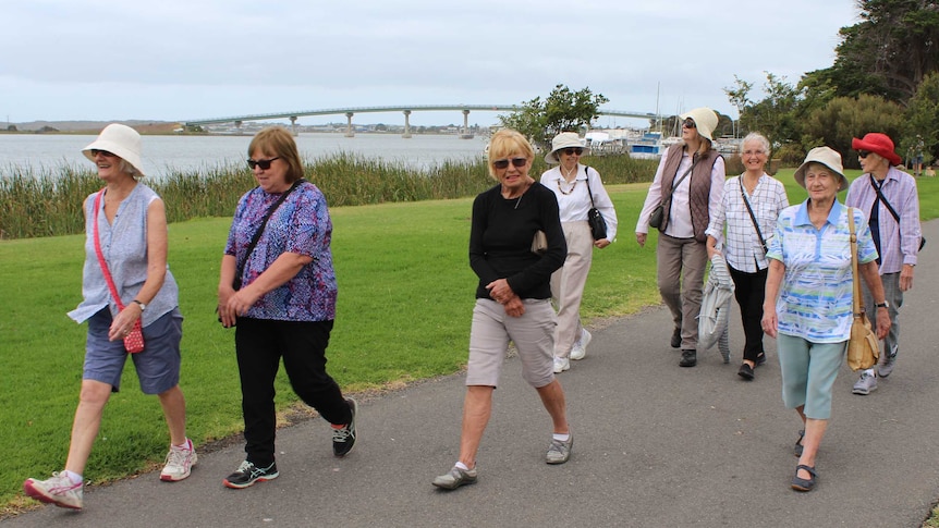 group of elderly ladies walking