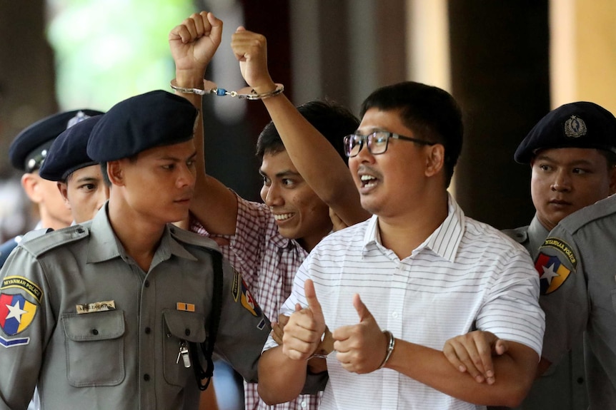 Detained Reuters journalist Wa Lone and Kyaw Soe Oo arrive at Insein court.