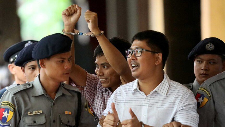 Detained Reuters journalist Wa Lone and Kyaw Soe Oo arrive at Insein court.