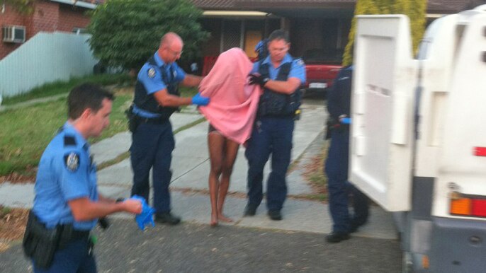 Police take the man into custody