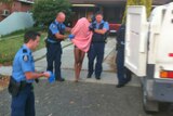 Police take the man into custody