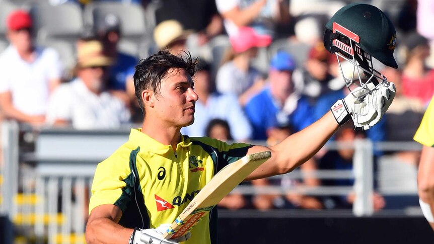 Australia's Marcus Stoinis celebrates his maiden ODI century against New Zealand at Eden Park.