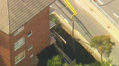 Sydney residents were evacuated after the 10-metre deep  hole appeared overnight.