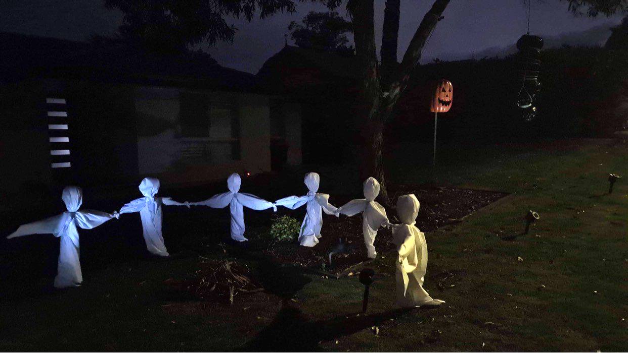 Halloween decorations including hanging body bag draw comparisons with