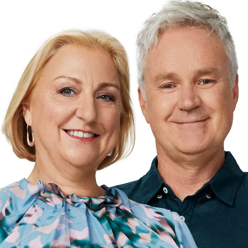 Sonya Feldhoff and Jules Schiller standing close together and smiling.