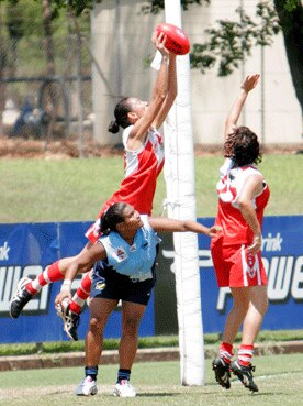 Women footballers play in the AFLNT