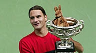 Roger Federer with the 2004 Australian Open trophy
