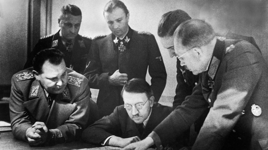 Adolf Hitler and his general staff review plans for Operation Bodenplatte, an airstrike in support of the Ardennes offensive.