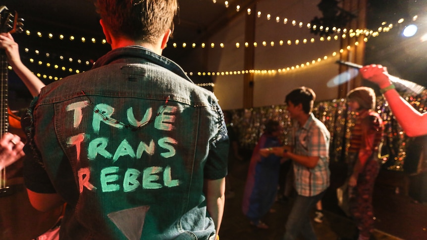 Jimmy sends out a loud and proud clear message on the back of his denim jacket - True Trans Rebel