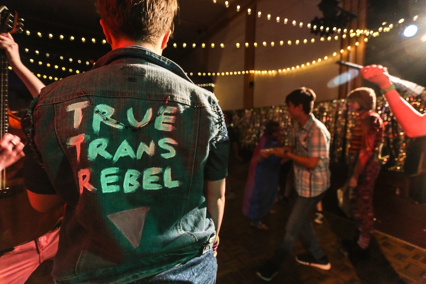 Jimmy sends out a loud and proud clear message on the back of his denim jacket - True Trans Rebel