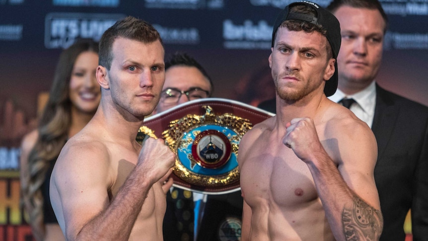 Jeff Horn (L) and Gary Corcoran at the official weigh-in for their world title fight in Brisbane.