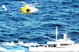 The fisherman was winched off the boat and has been flown to the Gold Coast for treatment.