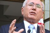 John Howard says the Coalition is committed to growing the renewable energy sector. (File photo)