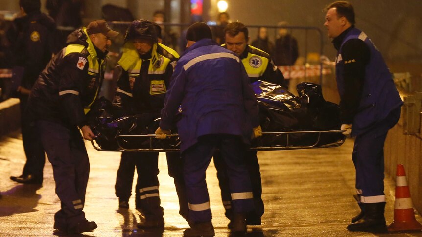 Medics carry the body of Boris Nemtsov