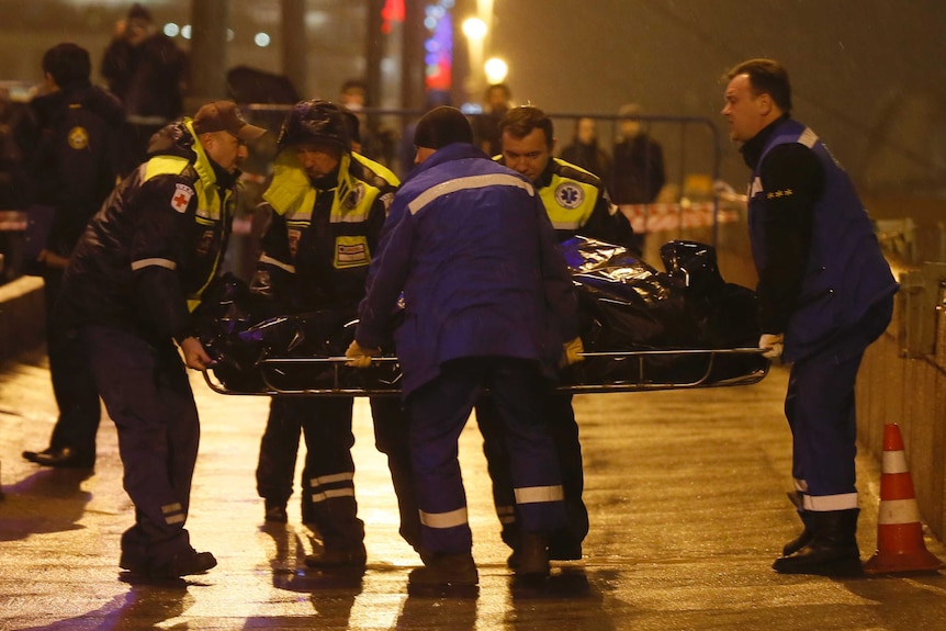 Medics carry the body of Boris Nemtsov