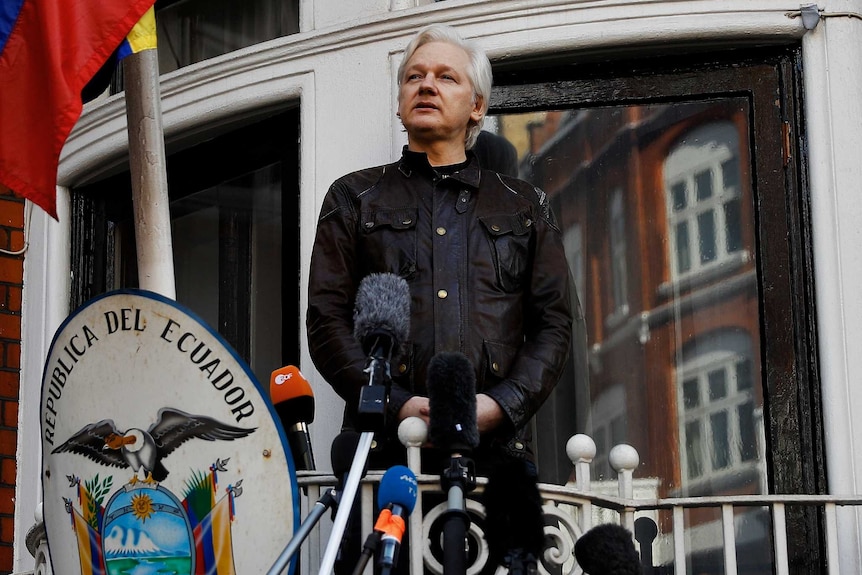 Julian Assange delivers a speech on the balcony of the Ecuadorian Embassy in London.