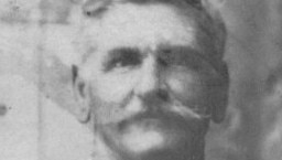 A black and white photo of Fergus 'Rogie' McFadzen