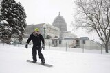 Snowboarder in US snowstorm