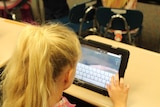 A girl using a tablet