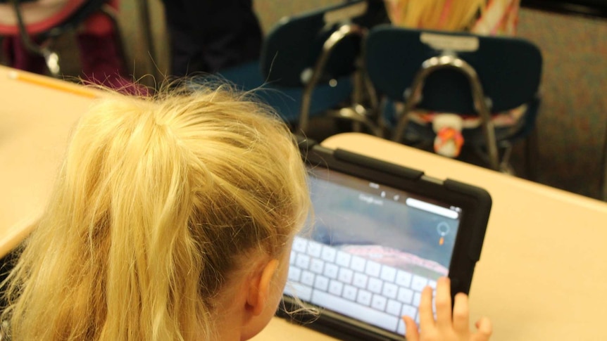 A girl using a tablet